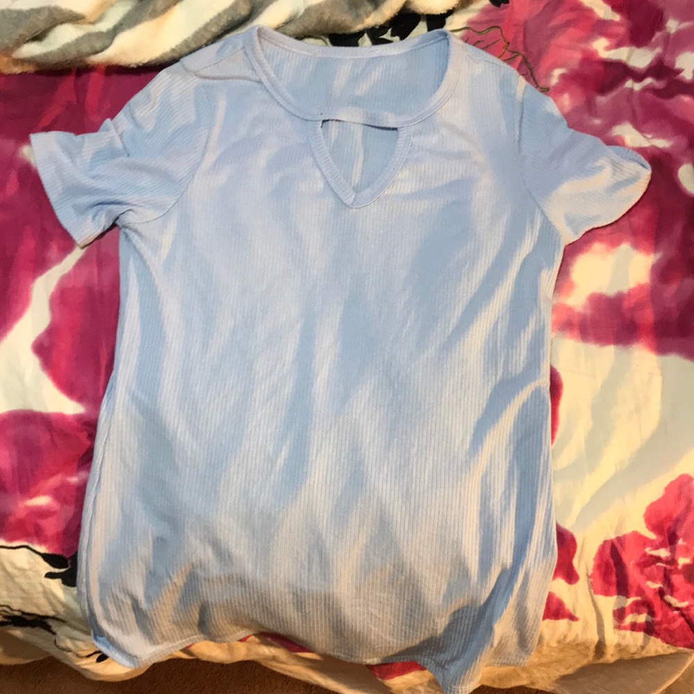 A blue XL kid shirt that I got from a boutique.